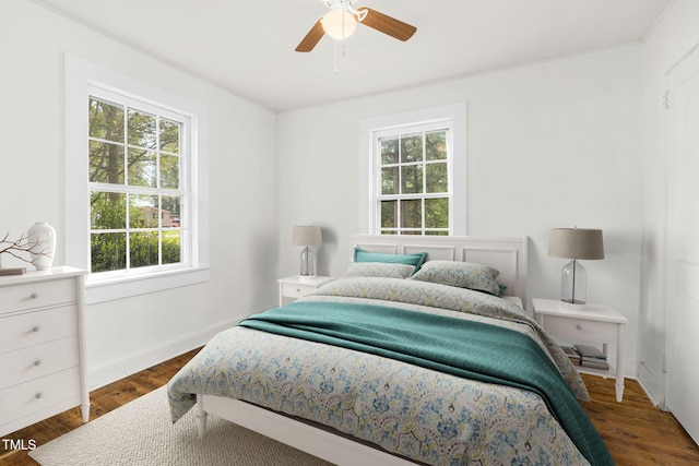 183 Red Hill Loop Rd, Warrenton, NC 27589 - bedroom featuring dark wood-style flooring, baseboards, and ceiling fan