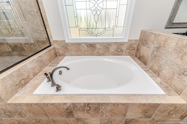 bathroom featuring a bath