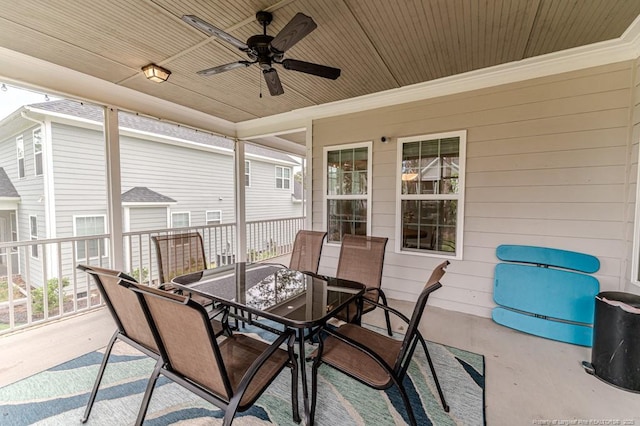 view of patio / terrace with outdoor dining space and a ceiling fan