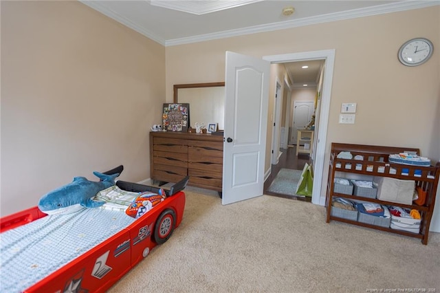 bedroom featuring ornamental molding and carpet floors