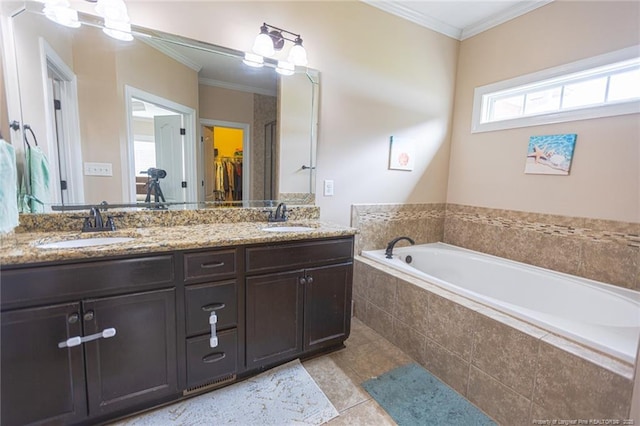 full bathroom with a sink, double vanity, and ornamental molding