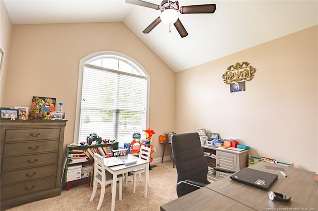 office area featuring lofted ceiling, carpet floors, and a ceiling fan