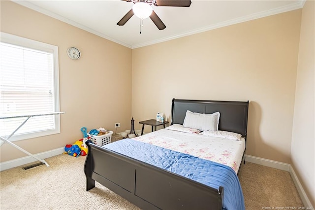 bedroom featuring carpet flooring, visible vents, baseboards, and ornamental molding