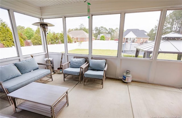sunroom / solarium with an outdoor hangout area