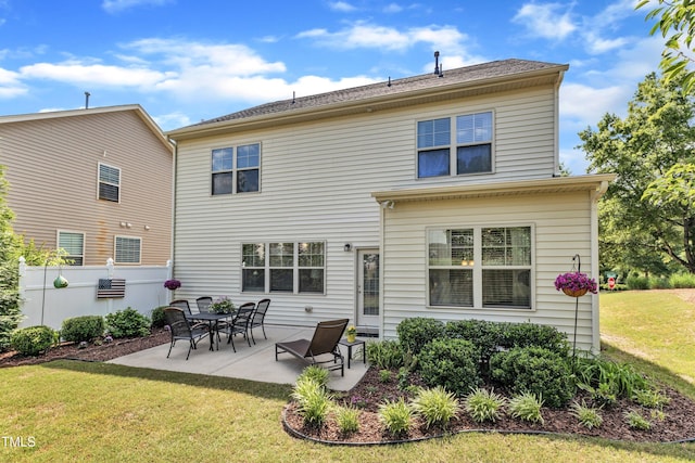 rear view of house with a patio