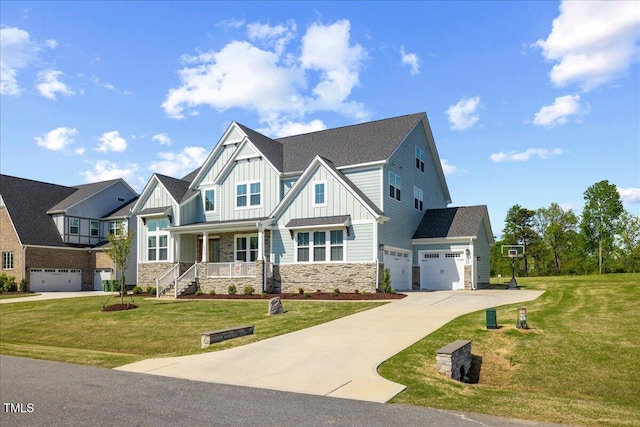 craftsman house featuring board and batten siding, covered porch, concrete driveway, stone siding, and a front yard