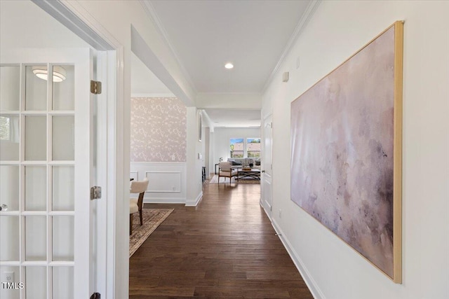 833 Ember Dr, Durham, NC 27703 - hall featuring ornamental molding, dark wood-type flooring, and a wainscoted wall