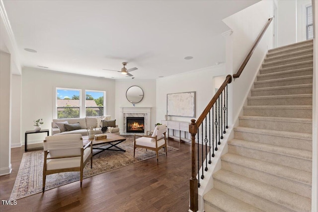 833 Ember Dr, Durham, NC 27703 - living area featuring a ceiling fan, stairway, dark wood-style floors, a premium fireplace, and baseboards