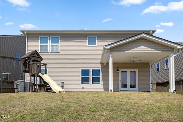 833 Ember Dr, Durham, NC 27703 - rear view of property featuring a playground