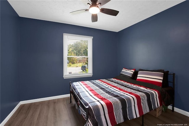 1618 Hickory Ridge Ct, Fayetteville, NC 28304 - bedroom with wood finished floors, baseboards, and a ceiling fan