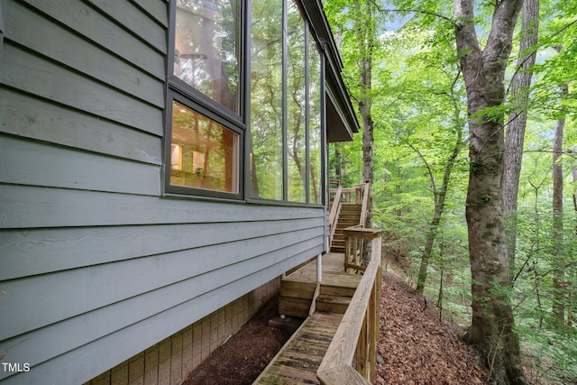 view of property exterior featuring stairs