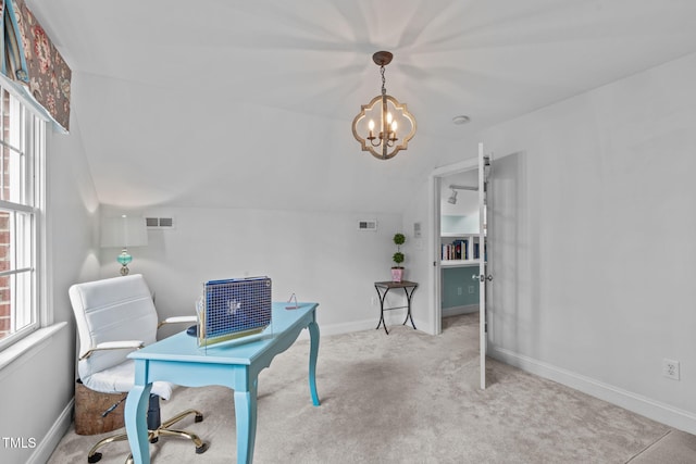 carpeted office space with a chandelier, lofted ceiling, and baseboards