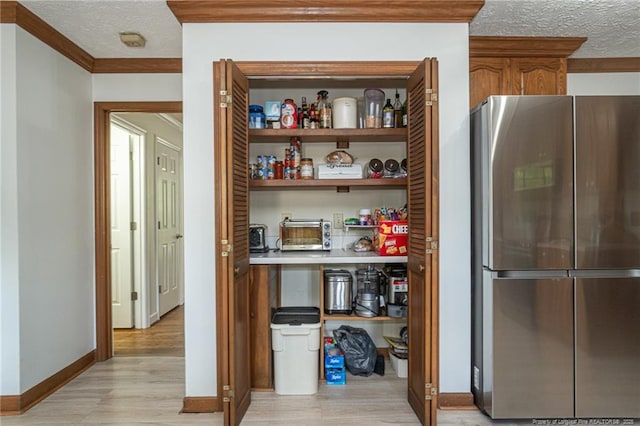 storage area featuring a toaster