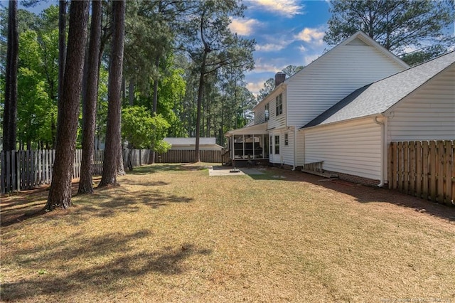 view of yard featuring a fenced backyard