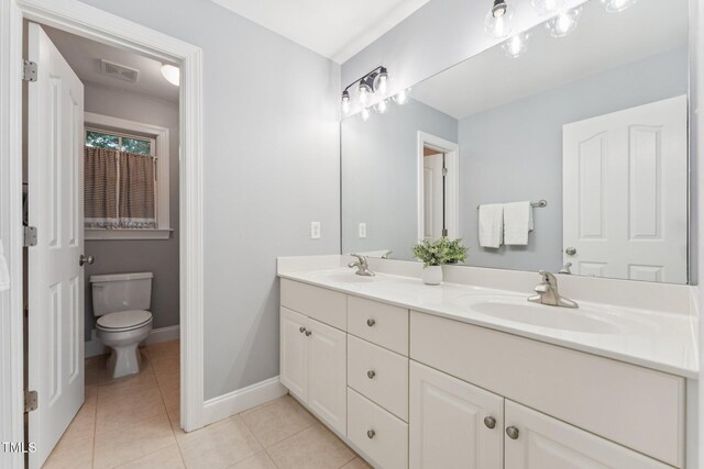 325 Wescott Ridge Dr, Holly Springs, NC 27540 - bathroom with double vanity and tile patterned flooring