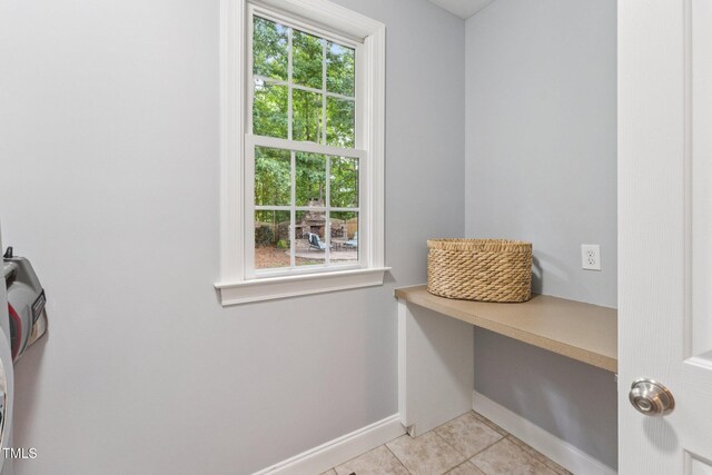 325 Wescott Ridge Dr, Holly Springs, NC 27540 - mudroom with baseboards and light tile patterned floors