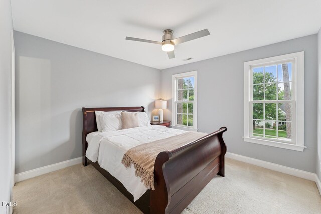 325 Wescott Ridge Dr, Holly Springs, NC 27540 - bedroom featuring light carpet and a ceiling fan