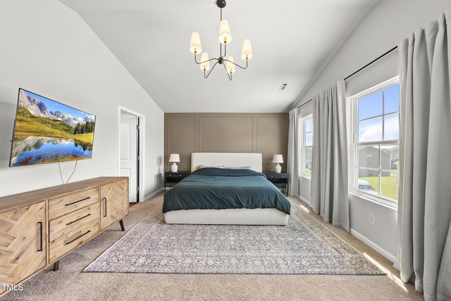 carpeted bedroom featuring lofted ceiling, a chandelier, multiple windows, and a decorative wall