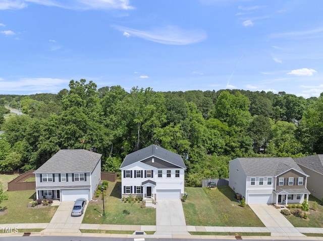 view from above of property featuring a forest