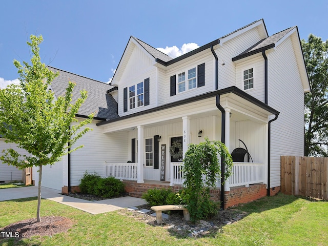 view of front facade with covered porch, a shingled roof, crawl space, a garage, and driveway