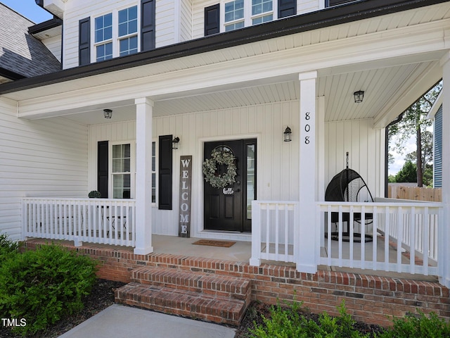 entrance to property with covered porch
