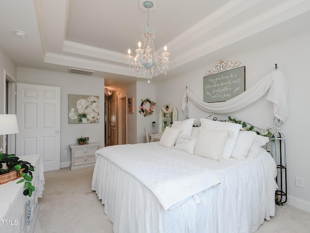 bedroom featuring a chandelier, light carpet, a tray ceiling, crown molding, and baseboards