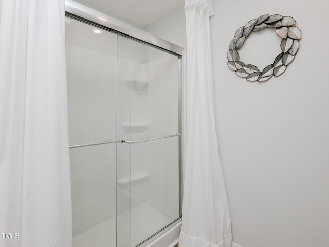 full bathroom with a stall shower