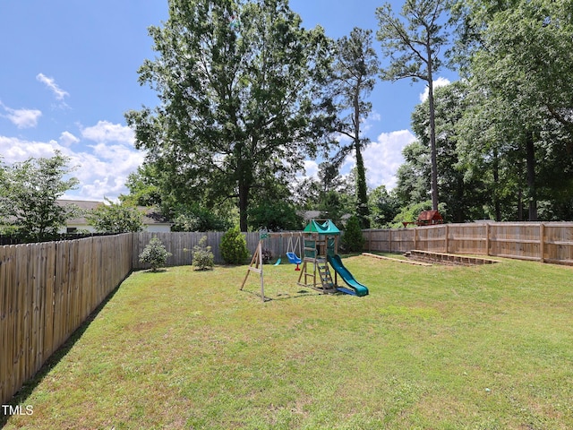 view of yard with a playground