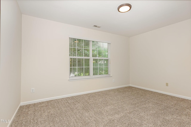 12340 Tetons Ct, Durham, NC 27703 - unfurnished room featuring carpet flooring and baseboards