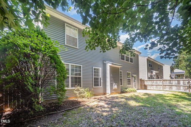 12340 Tetons Ct, Durham, NC 27703 - rear view of property with a patio