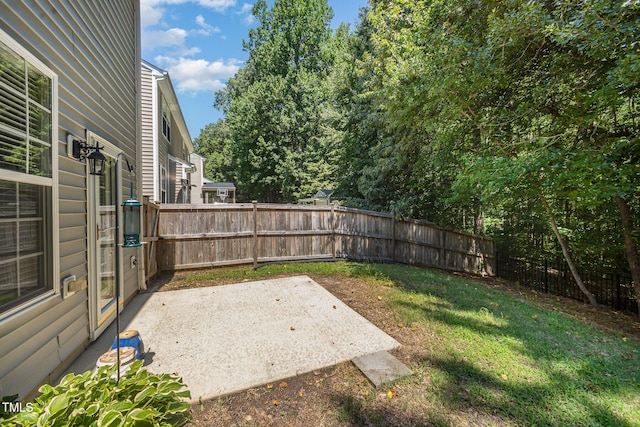 12340 Tetons Ct, Durham, NC 27703 - view of yard featuring a patio