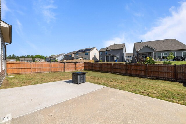 view of patio with a residential view