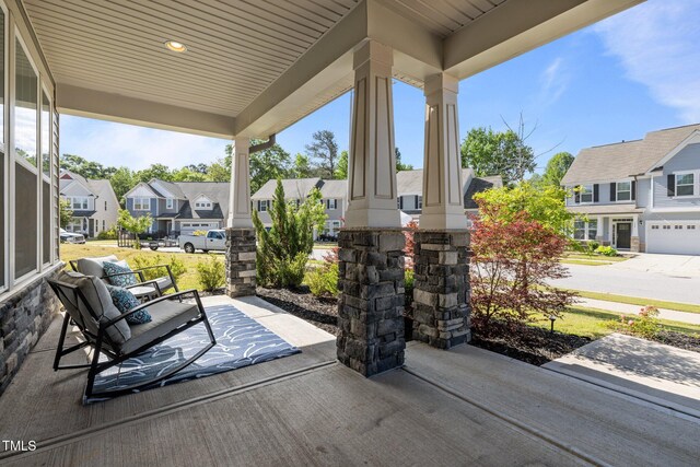 view of patio featuring a residential view and covered porch