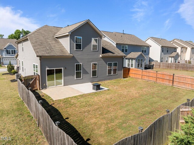 rear view of house with a residential view, a patio, and roof with shingles