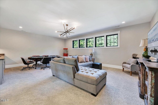 carpeted living area featuring a chandelier, baseboards, recessed lighting, and an office area