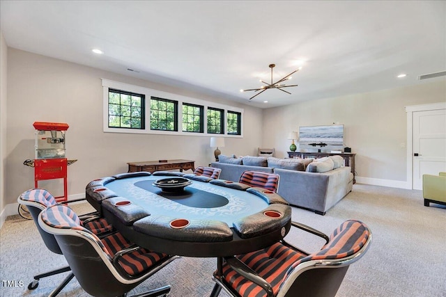 playroom featuring a chandelier, light carpet, baseboards, and recessed lighting