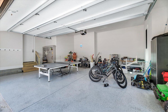 garage featuring a garage door opener
