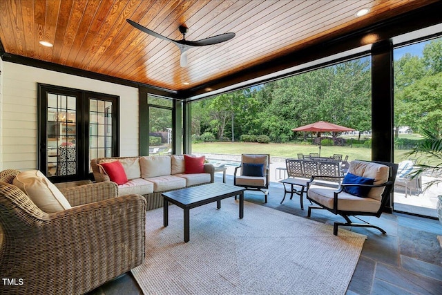 view of patio / terrace with an outdoor living space and ceiling fan