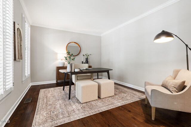 home office featuring wood finished floors, ornamental molding, and baseboards