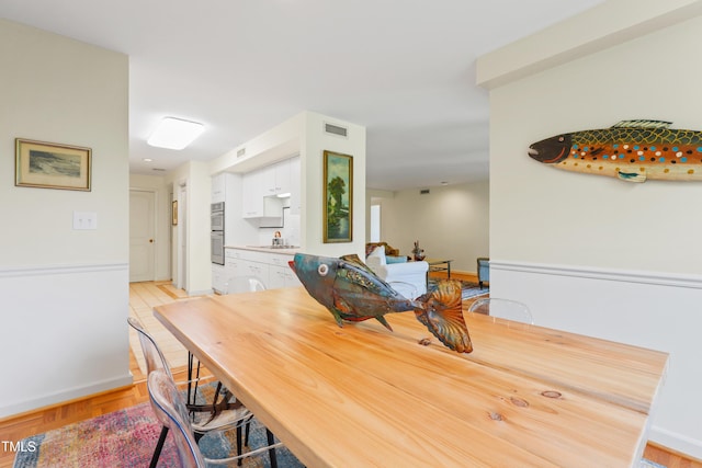 dining room with baseboards
