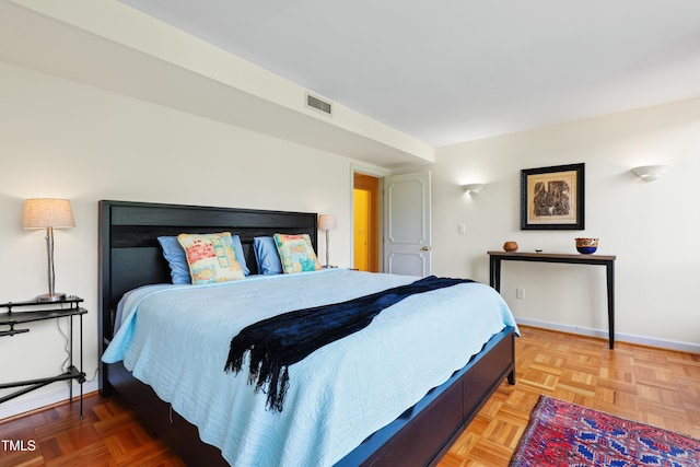 bedroom featuring baseboards
