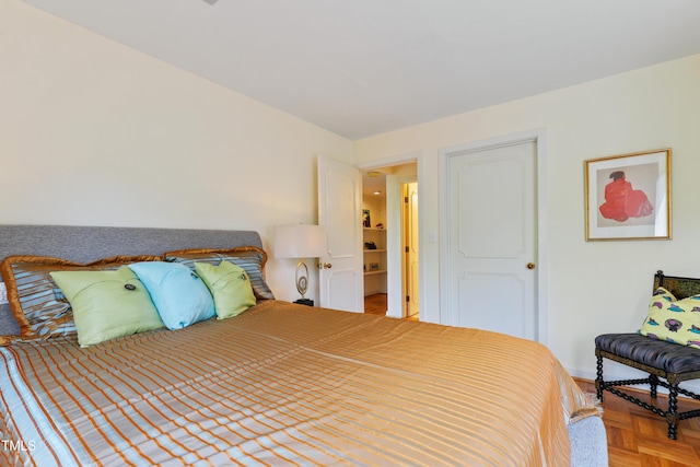 bedroom featuring baseboards