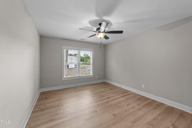 412 W Stallings St, Clayton, NC 27520 - empty room featuring light wood-type flooring, baseboards, visible vents, and ceiling fan