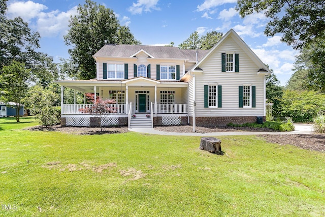 101 Rainbow Dr, Carrboro, NC 27510 - view of front of home featuring a porch and a front lawn