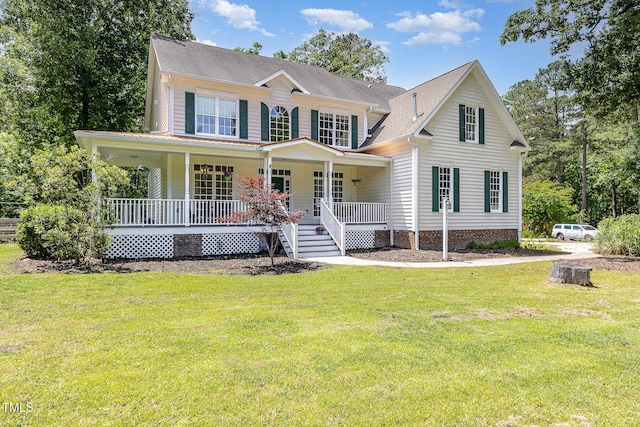 101 Rainbow Dr, Carrboro, NC 27510 - view of front of property featuring covered porch and a front lawn
