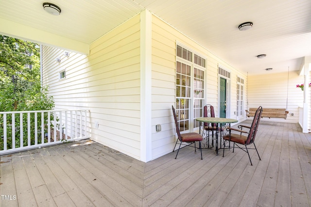 101 Rainbow Dr, Carrboro, NC 27510 - wooden terrace with a porch