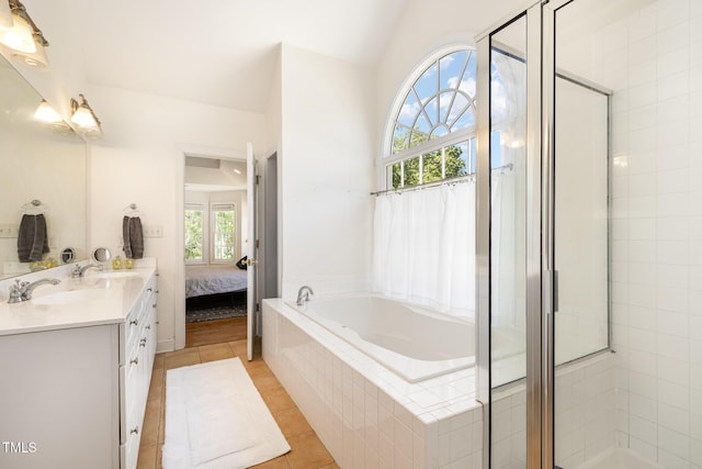 101 Rainbow Dr, Carrboro, NC 27510 - full bath featuring ensuite bathroom, a shower stall, double vanity, a bath, and tile patterned floors