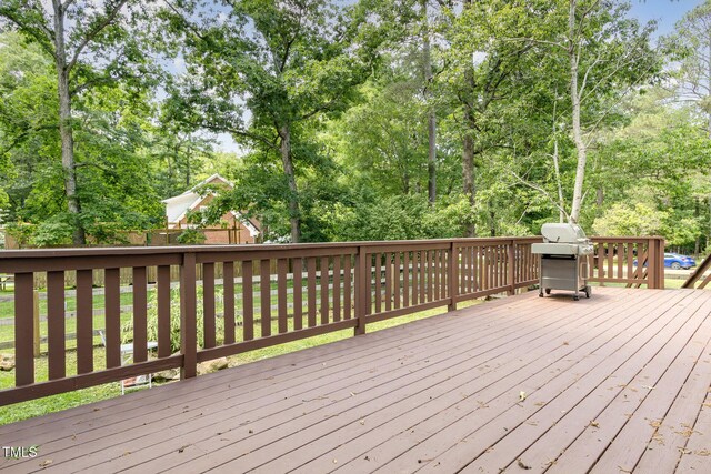 101 Rainbow Dr, Carrboro, NC 27510 - wooden terrace featuring a grill