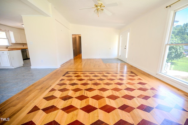 111 Marshay Meadow Rd, Youngsville, NC 27596 - unfurnished living room featuring ceiling fan and baseboards