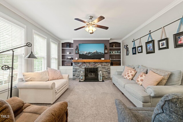 112 Nelson Ln, Clayton, NC 27527 - living room with ceiling fan, ornamental molding, built in features, carpet, and a fireplace